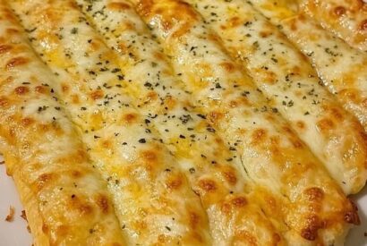 Thumbnail for Cheesy Garlic Breadsticks Recipe